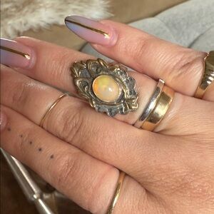 Elegant Opal and Silver Filigree Ring